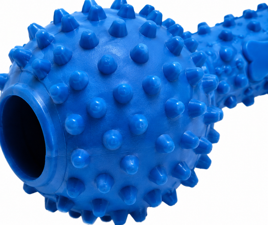 Close-up of a blue, spiky, textured massage roller with a smooth cylindrical