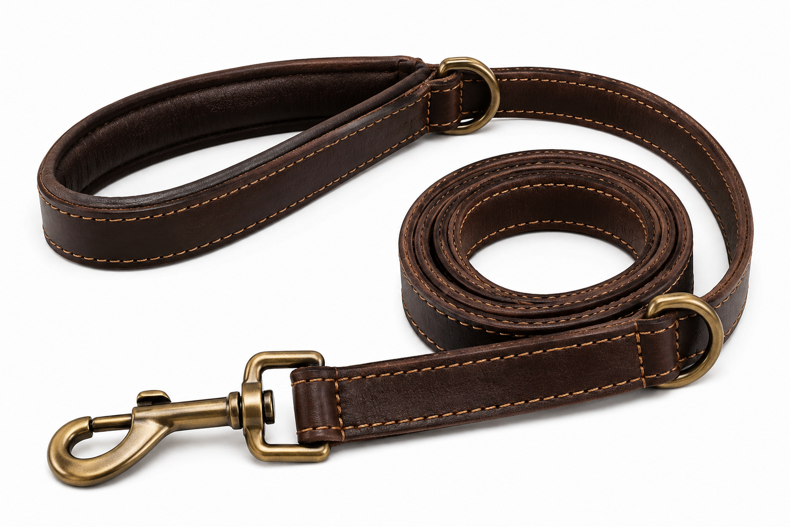 A sturdy brown leather dog leash with brass hardware laid out straight